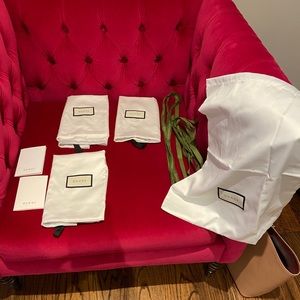 4 Brand new Gucci shoe cover sets & 2 ribbon/cards